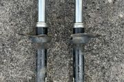 Left &amp; Right hand front suspension strut/shock absorber from a Subaru.