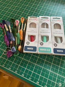 Crochet hooks and embroidery thread