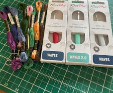 Crochet hooks and embroidery thread