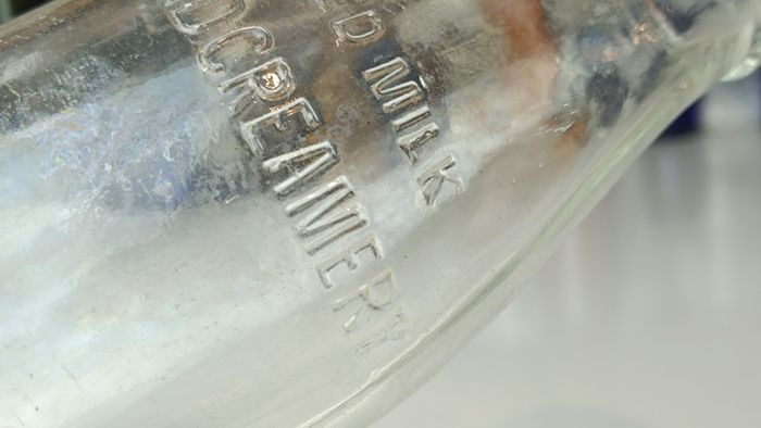 502 - Vintage Clear Glass Cork Top Collectible Decorative Lee Strand Creamery Milk Bottle