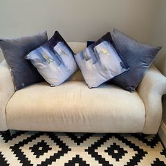 Cream 2 seater sofa