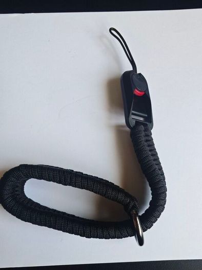 Camera wrist strap with quick release