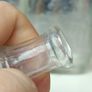 489 - Set of 7 Vintage Clear Glass Screw Cork Top Collectible Decorative Bottles Image 4
