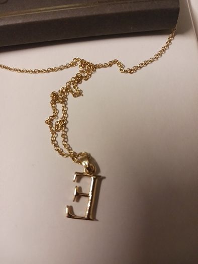 14 ct gold plated chain with E pendant
