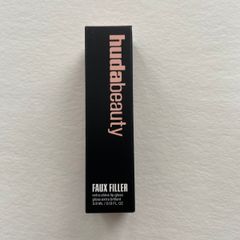 Huda beauty faux filler lip gloss in foxy