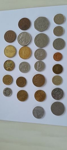 Coins a mix of different countries 28 coins in total registered post included