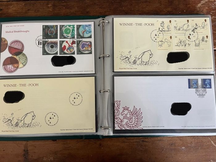 Collection of  77 UK First Day Cover stamps 2010 to 2013 in album