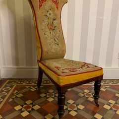 Victorian rosewood prie dieu or prayer nursing chair with original needlepoint upholstery.