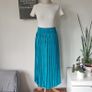 Vintage 1980s turquoise blue pleated midi length skirt. Made in Ireland by Michel Ambers, size 12. Image 2