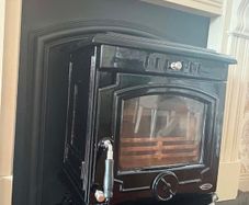Fireplace,Mirror And Henley Stove