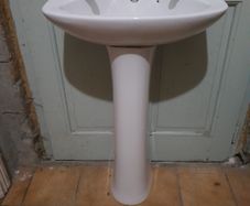 Small white sink & pedistal