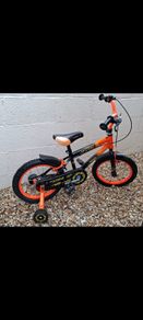 Boy's bike with stabilisers