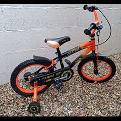 Boy's bike with stabilisers