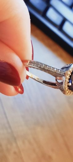 9 ct White Gold & Sapphire ring,size O. Cubic Zirconia