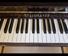 Steinmayer upright piano and stool perfect condition