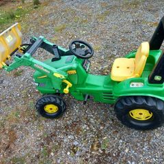 Childrens ride on tractor.