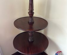 Three tier carved mahogany dumbwaiter
