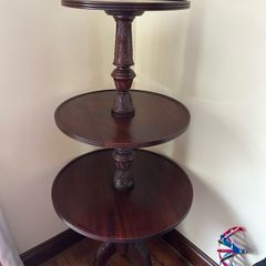 Three tier carved mahogany dumbwaiter
