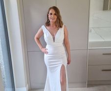 white full length v neck dress with side split