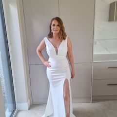white full length v neck dress with side split