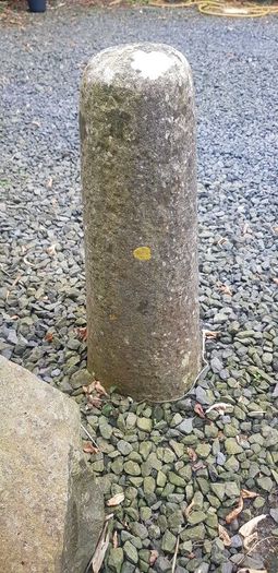 Coach stone, limestone, 20 inches above ground.