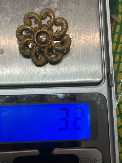 14kt gold pin wheel brooch