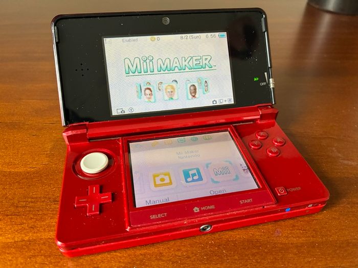 Flame Red Nintendo 3DS (NTSC-U), Tetris Axis, and sealed AR cards