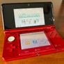 Flame Red Nintendo 3DS (NTSC-U), Tetris Axis, and sealed AR cards Image 3