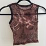 Brown mesh floral top with black trim Image 2