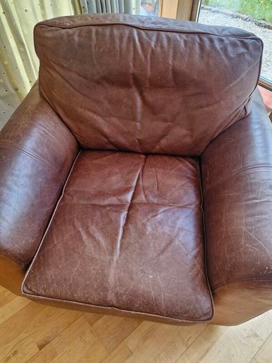 brown leather sofa and arm chair