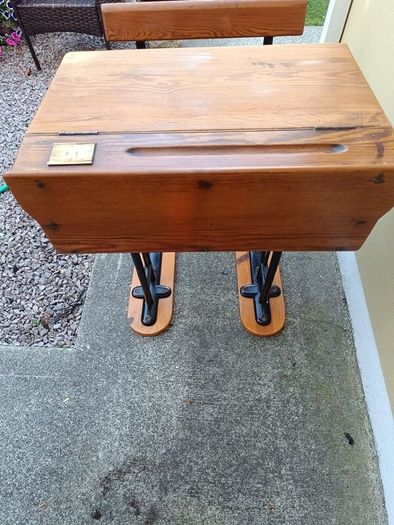 Old vintage single school desk with seat
