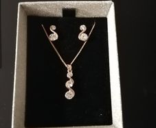 nice earring and necklace set for sale brand new.