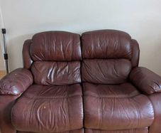 Two seater brown leather recliner and armchair