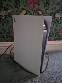 PS5 standard console with controller