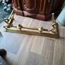 Beautiful Antique Victorian Art Nouveau Brass Fireplace Fender features ornate scrolling end terminals and central urn finials, Image 2