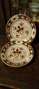 2 butter pat dishes or expresso saucers