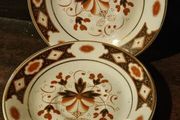 2 butter pat dishes or espresso saucers