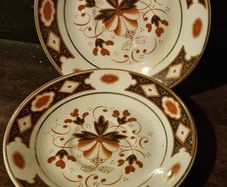 2 butter pat dishes or espresso saucers
