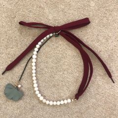 Neckless