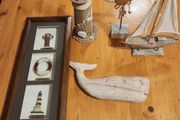 Nautical Themed Decorative Items x6 A Lighthouse And A Sailing Boat 2 Fish And A Windchimes. All In Good Condition.
