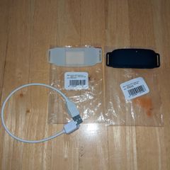 Tractive Cat 4 GPS tracker sleeves + charging cable