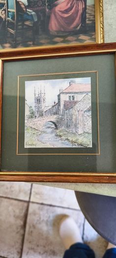 2 framed art work- 1- Vermeer's The Glass of Wine Fine Art Print -  Classic Wall Decor . 25.00euro.2- Helmsley Yorksire Colin Williamson Watercolour 35.00 euro.