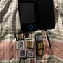 2DS XL Console Black & Turquoise + Pokemon Games Image 2