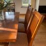 Beautiful long dark Oak Dining table and 8 chairs Image 3
