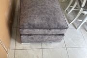 Grey footstool