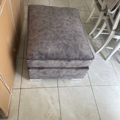 Grey footstool