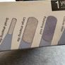 Portable, battery-operated manicure system designed for travel. Image 4