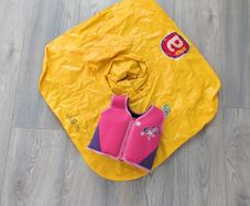Infant swimming aid and float