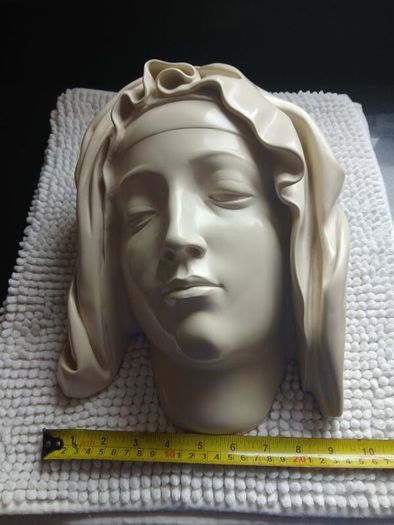 Antique wall religious sculpture