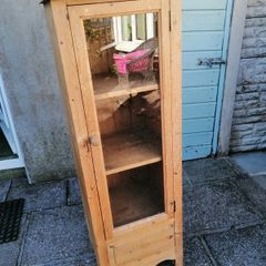 Tall pine display cabinet